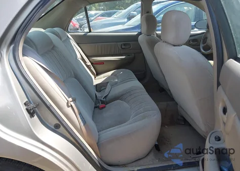 1999 Buick Century Custom z USA, uszkodzony, nr VIN 2G4WS52M3X1599908